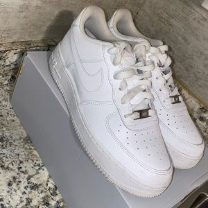 All white Low Top Air Force 1s